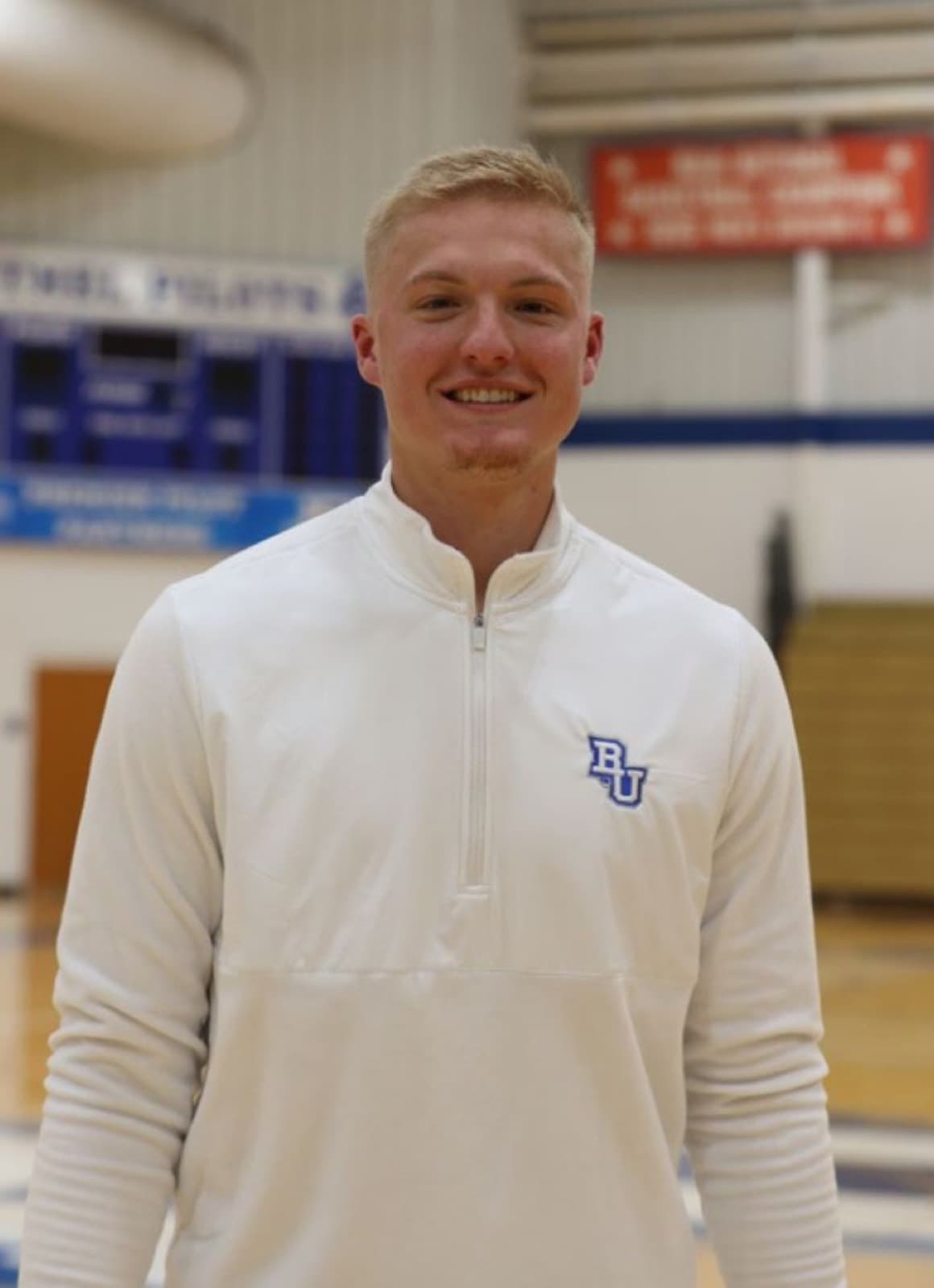 Nolan Mader on court at Bethel University, where he is an assistant coach