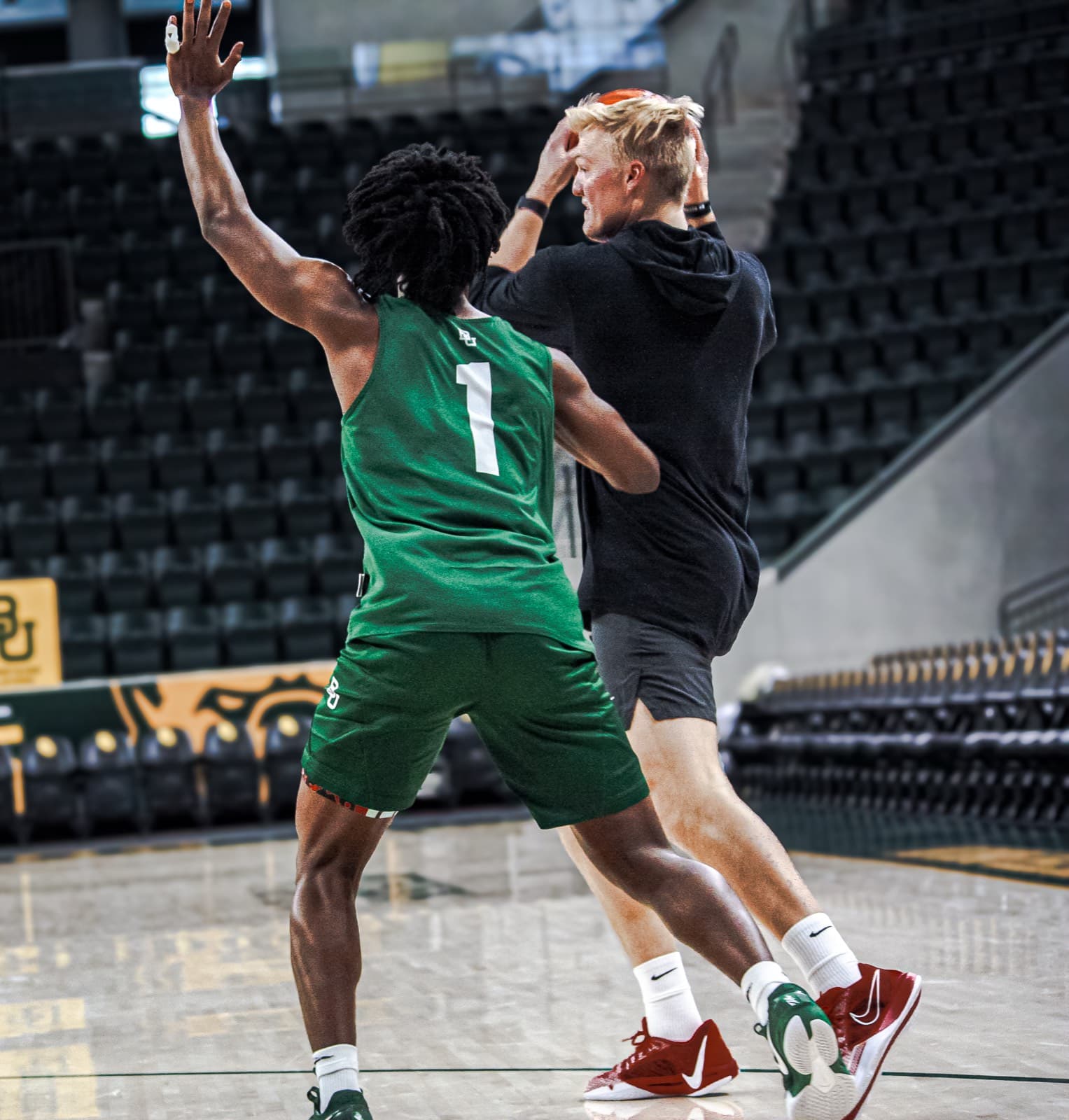 Nolan Mader working closely with a player during an on-court session